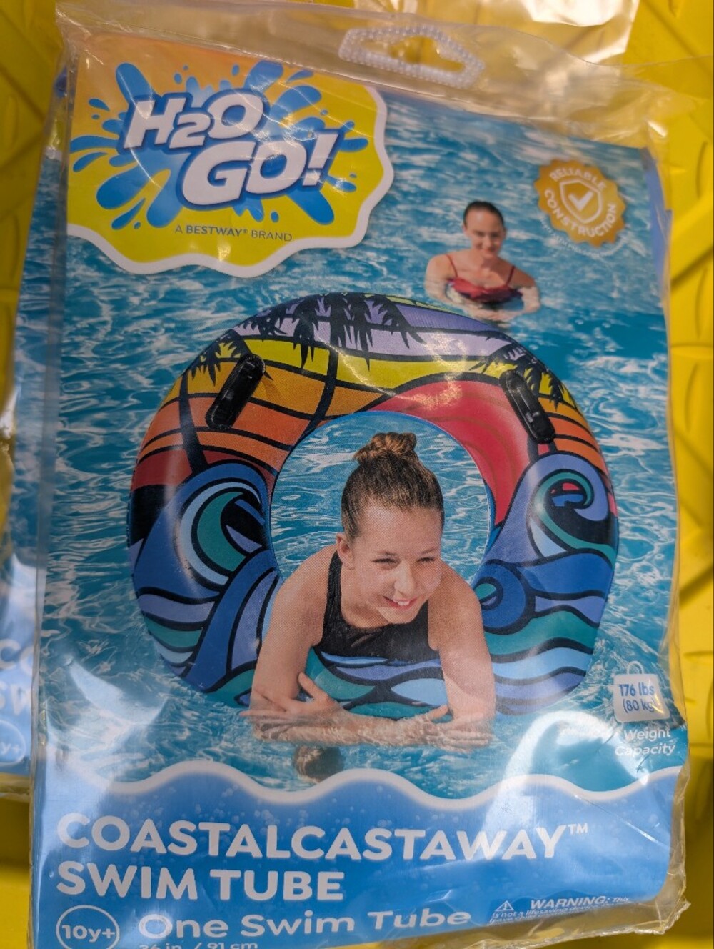 Castaway Coastal Swim Tube in Blue, Teal, Purple, Red, Orange, Yellow